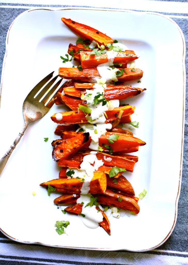 SPICY ROASTED SWEET POTATOES WITH YOGURT SAUCE Recipe - Studio Delicious